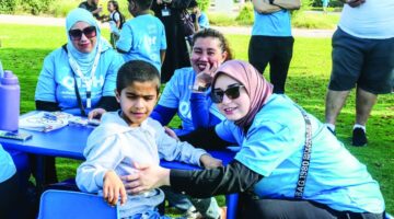 مسيرة بحديقة البدع لدعم أطفال التوحد