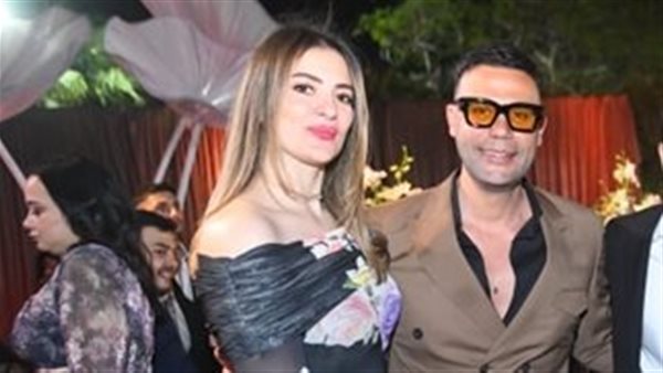 زوجة محمد إمام تظهر بإطلالة أنيقة في حفل زفاف ابنة عصام إمام (صور) زوجة محمد إمام تظهر بإطلالة أنيقة في حفل زفاف ابنة عصام إمام (صور)
