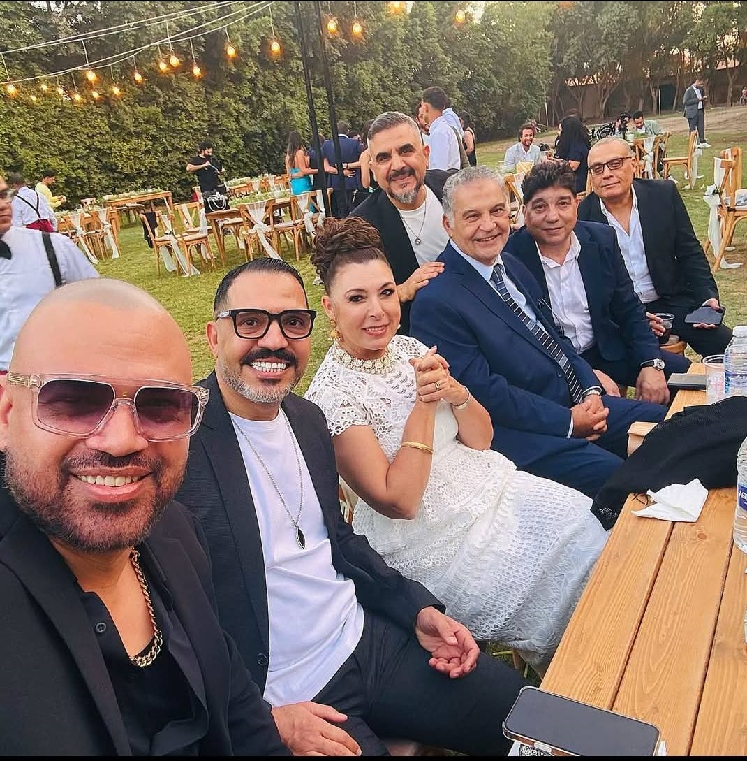 May be an image of 7 people and wedding