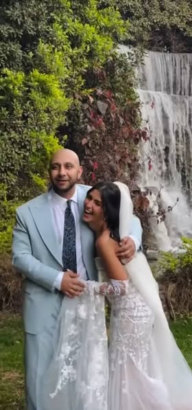 May be an image of 2 people and wedding