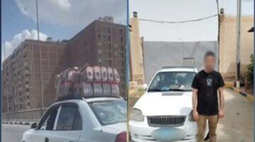 ضبط سائق سمح لشخص بالجلوس على الجزء الأمامي من سيارته