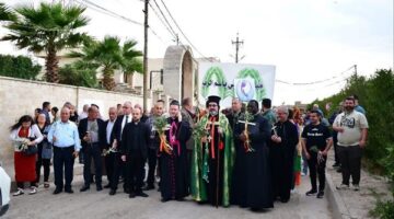 مسيرة السعانين توحّد أبناء السريان في برطلة