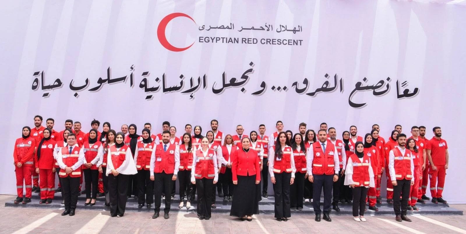 May be an image of ‎14 people and ‎text that says '‎الهلال الأحمر حمر ى المصرى EGYPTIAN C CRESCENT RED معًا نصنع ...الفروه نجعل الإنسانية أسلوب حياة‎'‎‎