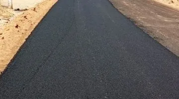 تعرف على جهود محافظة أسوان فى خطة رصف الشوارع.. صور
