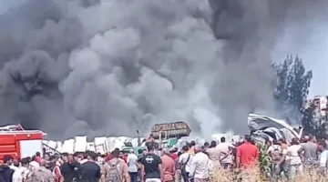 السيطرة على حريق شب بأرض فضاء بالصف