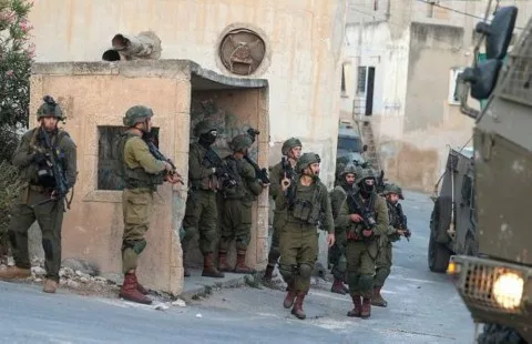 الضفة الغربية: إصابة فلسطيني بنيران إسرائيلية واعتداء مستوطنين على مدرسة الضفة الغربية: إصابة فلسطيني بنيران إسرائيلية واعتداء مستوطنين على مدرسة