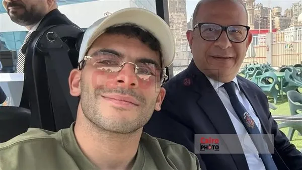 المحامي أشرف عبد العزيز رفقة زيزو من داخل نادي الزمالك بعد انتهاء التحقيق مع اللاعب المحامي أشرف عبد العزيز رفقة زيزو من داخل نادي الزمالك بعد انتهاء التحقيق مع اللاعب