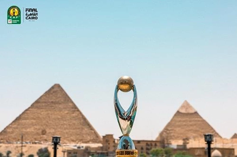 بمساهمة بيراميدز.. كاف يكشف عن تصميم جديد لكأس دوري أبطال أفريقيا قبيل المباراة النهائية. بمساهمة بيراميدز.. كاف يكشف عن تصميم جديد لكأس دوري أبطال أفريقيا قبيل المباراة النهائية.