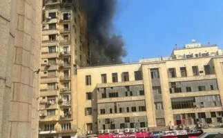 حريق في عقار أعلى بنك شهير بوسط البلد