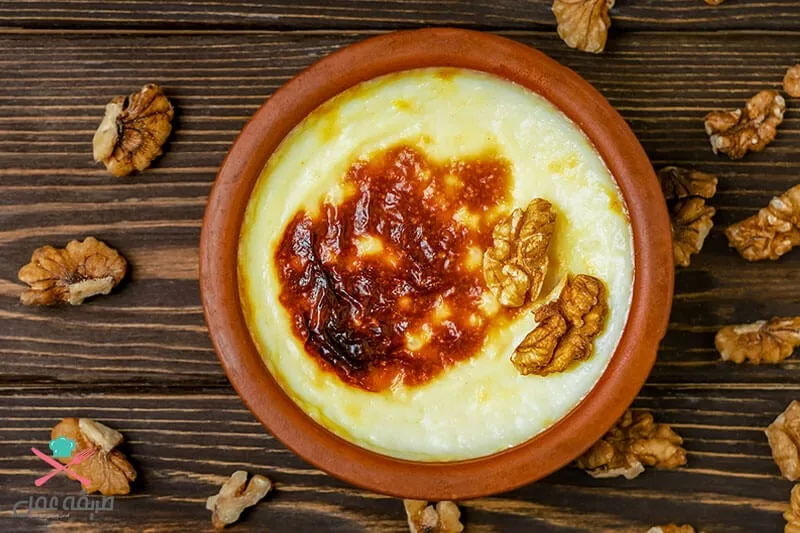 طريقة عمل أرز باللبن بالبرتقال بوصفة احترافية.. اتبعي هذه الخطوة عند التسوية طريقة عمل أرز باللبن بالبرتقال بوصفة احترافية.. اتبعي هذه الخطوة عند التسوية
