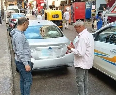 لمنع جراجات الرصيف.. لجنة لتسجيل أرقام السيارات التي تُعيق الحركة المرورية بشوارع إيتاي البارود لمنع جراجات الرصيف.. لجنة لتسجيل أرقام السيارات التي تُعيق الحركة المرورية بشوارع إيتاي البارود