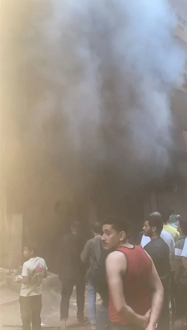 مصرع صغير في حريق محل ببرج سكني بشارع فيصل | صور مصرع صغير في حريق محل ببرج سكني بشارع فيصل | صور