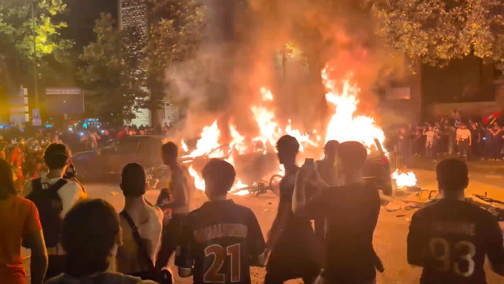 Fans clash with riot police in Paris after PSG's historic Champions League  win