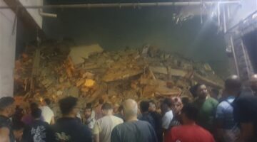 الأمن يصل إلى مكان انهيار المبنى في السيدة زينب