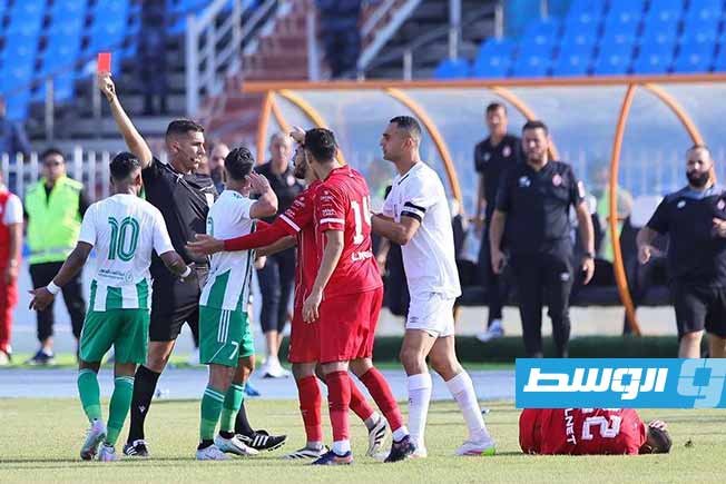 اشتباكات بين لاعبي الاتحاد والأهلي طرابلس خلال مباراة الديربي بينهما، 18 يونيو 2025 (الإنترنت)
