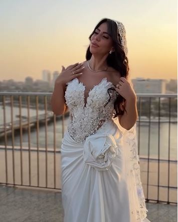 May be an image of 1 person and wedding