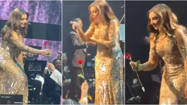 مفاجأة لمعجبة: وردة من أحد المعجبين في حفل أنغام بالكويت مفاجأة لمعجبة: وردة من أحد المعجبين في حفل أنغام بالكويت