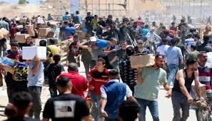 رفض دولي لتوزيع المساعدات بطرق تتنافى مع المبادئ الإنسانية
