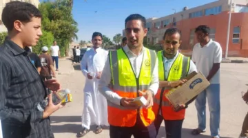 حزب الجبهة الوطنية في جنوب سيناء distributes bottles of water and juices to high school students outside exam centers.