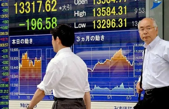 أسواق آسيا تشهد تراجعاً وسط انتظار لقرارات الفيدرالي الأمريكي