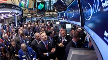 أسواق الأسهم الأمريكية تنهي تعاملاتها بتفاوت في الأداء
