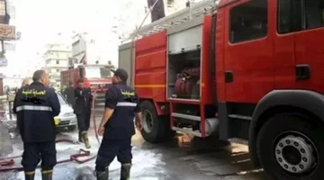 إخماد حريق في سوق بمنطقة فيصل