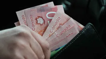 التحليل الفني: زوج العملات USD/CAD يتداول ضمن نطاق صاعد
