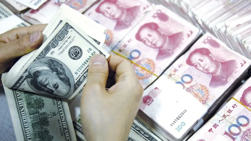 انخفض سعر اليوان الصيني مقابل الدولار انخفض سعر اليوان الصيني مقابل الدولار