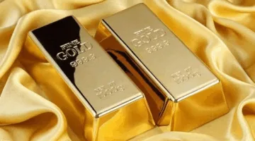 تراجع الذهب بشكل طفيف مع ارتفاع الدولار قبل الاجتماع المرتقب للاحتياطي الفيدرالي