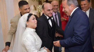محافظ بورسعيد يشارك في زفاف بطلي ذوي الهمم