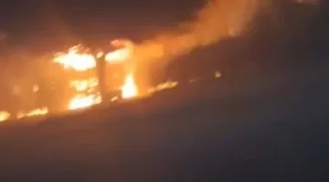 إخماد حريق في مخلفات على كورنيش النيل بحلوان