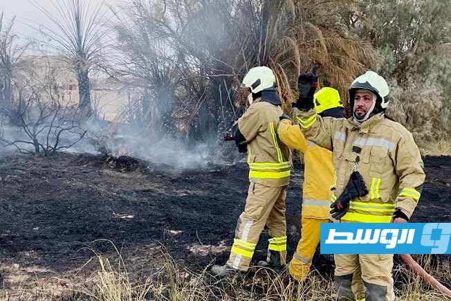 من أعمال إطفاء حرائق بمدينة العوينات، 14 يوليو 2025. (المؤسسة الوطنية للنفط)