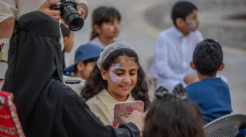 العائلة وذوي الاحتياجات الخاصة في نشاط ترفيهي للأطفال