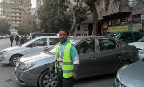 رغم تنظيم نشاطهم.. أزمة “مراقبي مواقف السيارات” في المحافظات رغم تنظيم نشاطهم.. أزمة “مراقبي مواقف السيارات” في المحافظات