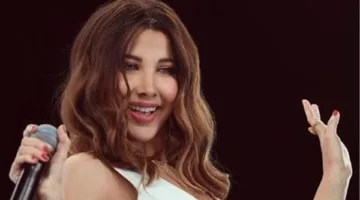 نانسي عجرم تواجه الانتقادات بسبب مظهرها الأخير في فيديو بعد ارتدائها جوارب شفافة