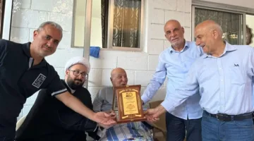 حركة أمل تكرّم المعلم حسين فران في منطقة المساكن
