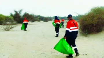 حملة تنظيف في روضة أم القرضي