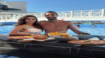 6 لقطات لرامي صبري وزوجته شيما صابر في بركة السباحة