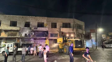 بلدية إربد تقوم بإزالة تجاويف المباني القديمة المهددة بالانهيار (صور)