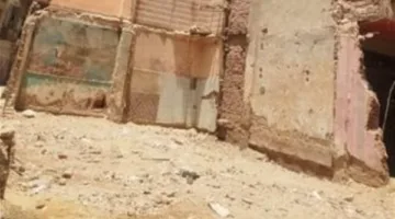 إزالة بناء مهدد بالانهيار في حارة سوق الأحد بالجيزة