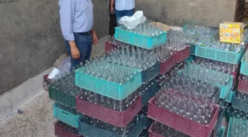 إغلاق مصنع غير مرخص لبيع العصائر المقلدة ومصادرة 888 زجاجة في أسيوط