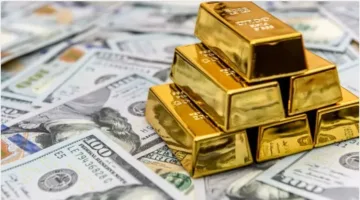 الذهب ينخفض عن ذروته الشهرية بسبب قوة الدولار وعوائد السندات