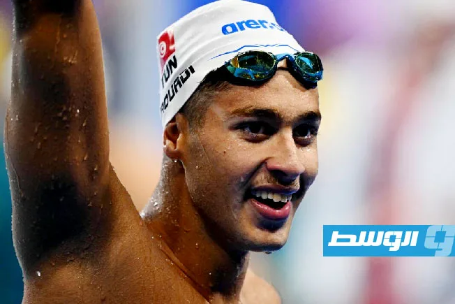 السباح التونسي أحمد الجوادي يحقق ميدالية ذهبية في سباق 800 متر خلال بطولة العالم السباح التونسي أحمد الجوادي يحقق ميدالية ذهبية في سباق 800 متر خلال بطولة العالم