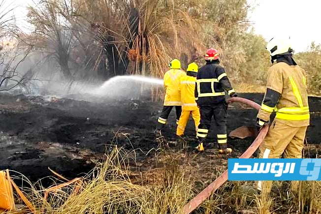 من أعمال إطفاء حرائق بمدينة العوينات، 14 يوليو 2025. (المؤسسة الوطنية للنفط)