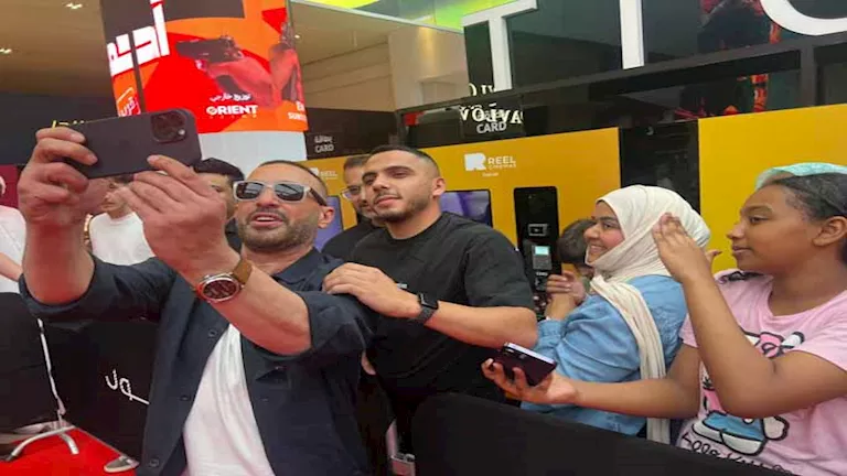 صور: السقا يحتفل بإطلاق فيلمه “أحمد وأحمد” مع جمهوره في دبي صور: السقا يحتفل بإطلاق فيلمه “أحمد وأحمد” مع جمهوره في دبي