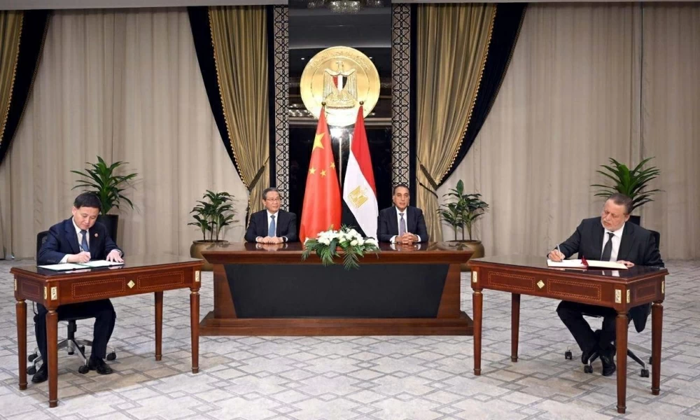 مصر والصين توقعان اتفاقية تعاون مالي لتعزيز استخدام العملات المحلية. مصر والصين توقعان اتفاقية تعاون مالي لتعزيز استخدام العملات المحلية.