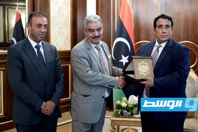 لقاء المنفي مع المبعوث الخاص للرئيس الفلسطيني المستشار عاطف عودة، الأحد 3 أغسطس 2025. (المجلس الرئاسي)