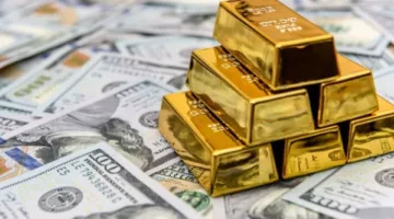 الذهب يتراجع من ذروته خلال أسبوعين بسبب ارتفاع قيمة الدولار