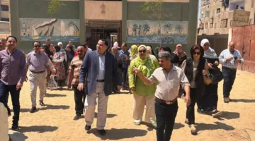 عميد كلية السياحة والفنادق بالفيوم يقود مسيرة نحو مراكز الاقتراع