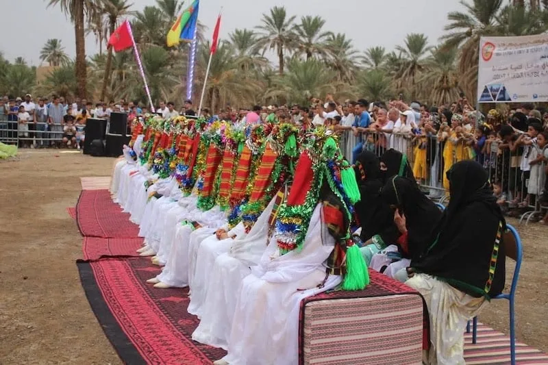 ساكنة ألنيف تحتفل بالزفاف الجماعي للعام العشرين على التوالي ساكنة ألنيف تحتفل بالزفاف الجماعي للعام العشرين على التوالي